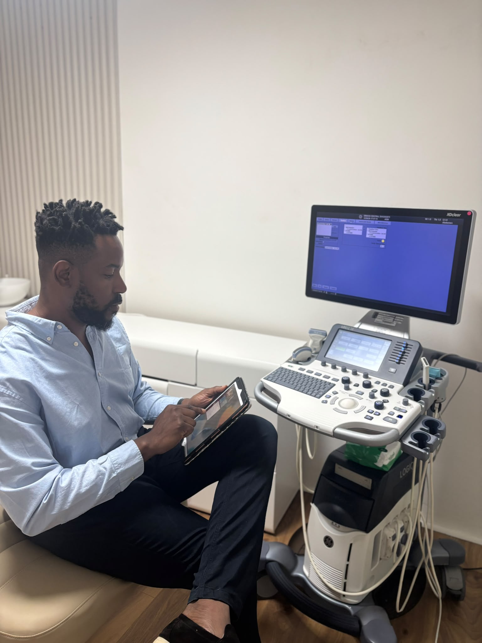 Calm private consultation room with modern medical equipment